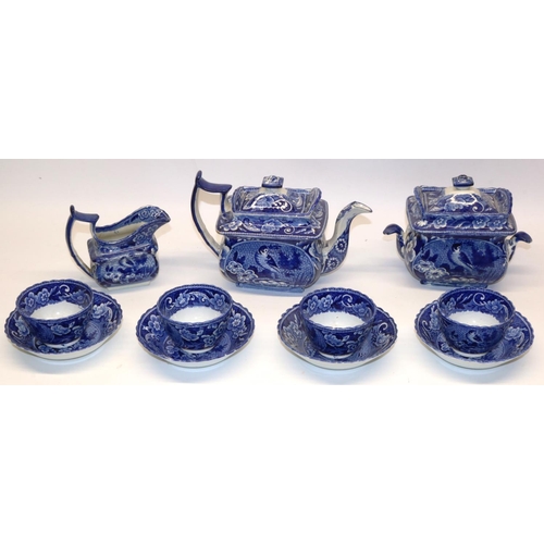 1111 - Early C19th blue & white pearlware tea set, printed with exotic birds in scale reserve panels on flo... 