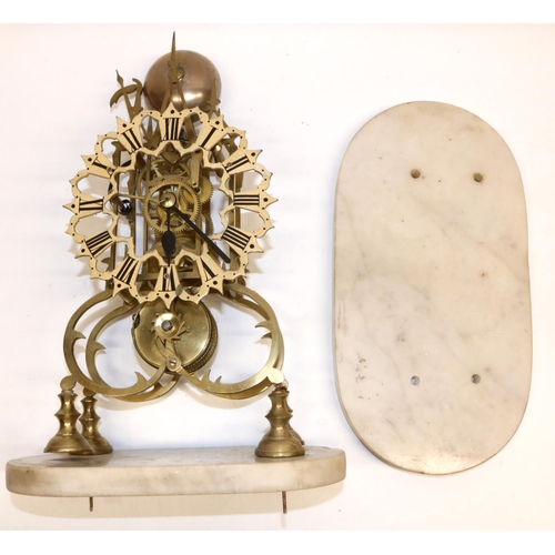 1254 - C19th brass skeleton clock on white marble base, the pierced frame of triple turreted Gothic design,... 