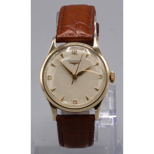 1067 - 1950's presentation Longines gold wristwatch, signed silvered dial with applied Arabic and baton hou... 