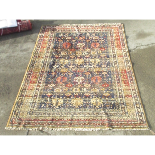 1311 - Belgian wool Persian pattern multicoloured carpet, scroll and medallion filled blue ground field in ... 