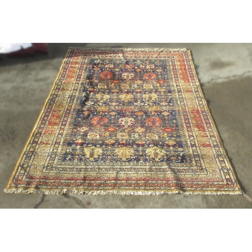 1311 - Belgian wool Persian pattern multicoloured carpet, scroll and medallion filled blue ground field in ... 