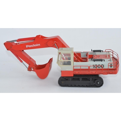 6 - Two boxed 1/50 scale diecast hydraulic excavator models to include a CEF 1/50 scale diecast Poclain ... 