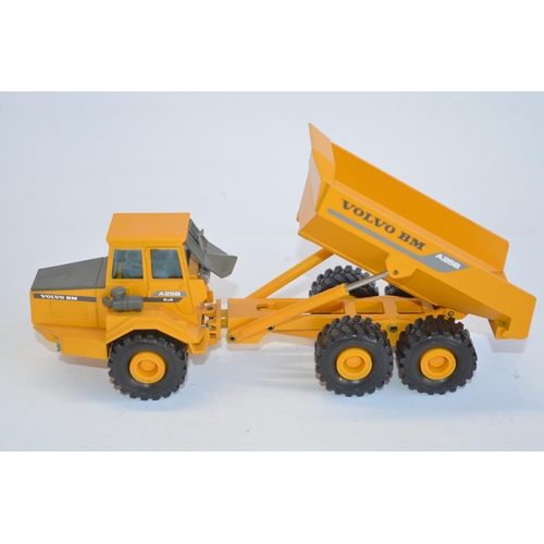 25 - Collection of diecast Volvo plant models to include 4x 1/50 scale BM L180C with various configuratio... 