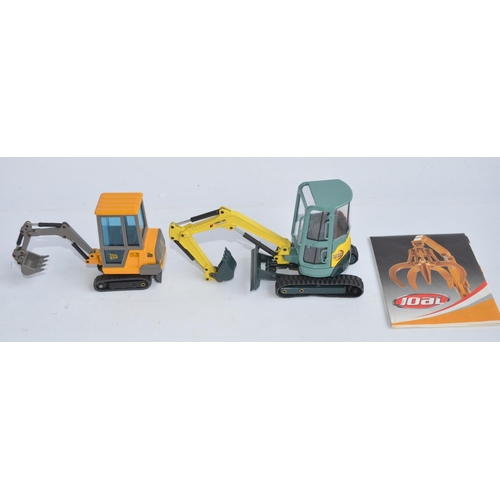 33 - Joal 1/35 diecast JCB 50 Years Commemorative set with 4CX Backhoe Loader and Farm Trailer with mould... 