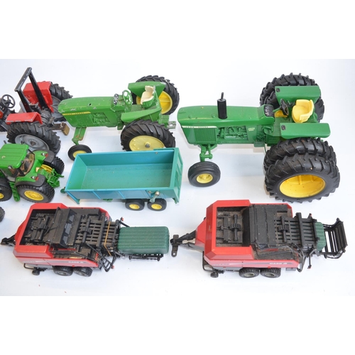 51 - Collection of previously displayed tractor and farming machinery models, diecast and plastic, variou... 