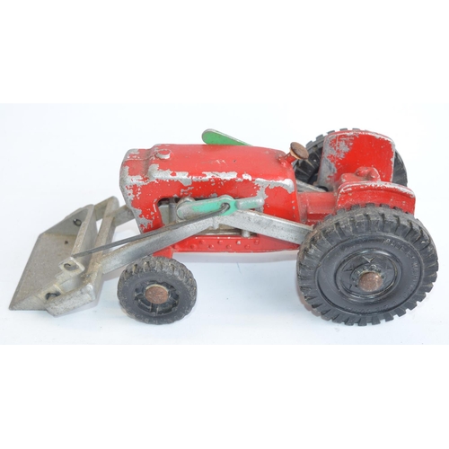 51 - Collection of previously displayed tractor and farming machinery models, diecast and plastic, variou... 