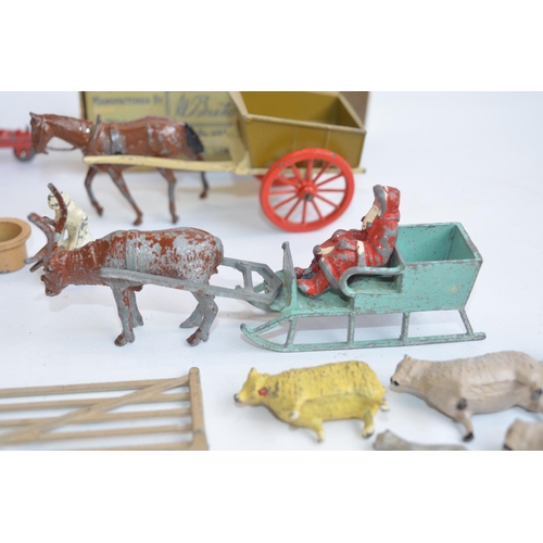 55 - Collection of vintage cast metal farm and other models to include Britain's figures, animals, boxed ... 