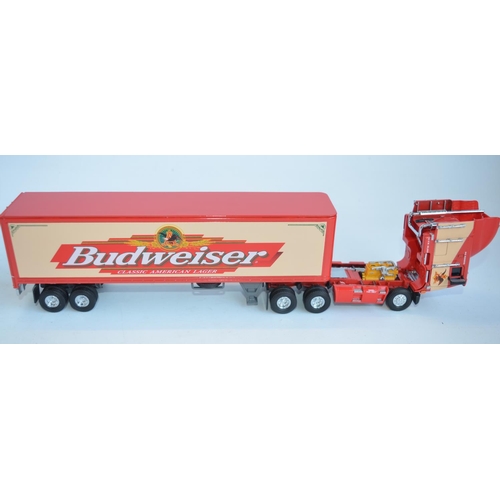 69 - Three boxed 1/58 scale Budweiser themed diecast truck models to include Matchbox Collectibles DYM382... 