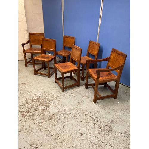 621 - Robert Mouseman Thompson of Kilburn - a set of six (4 + 2) oak dining chairs, with adzed panel backs... 