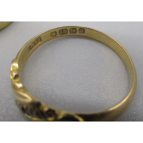 33 - 18ct yellow gold wedding band, size L1/2, and an 18ct yellow gold ring set with a row of three brill... 