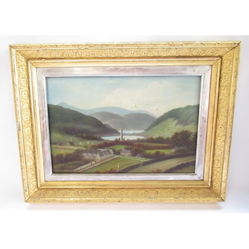 479 - A. Harris (British early C20th); Extensive lakeland landscape with village, tower and figures, oil o... 