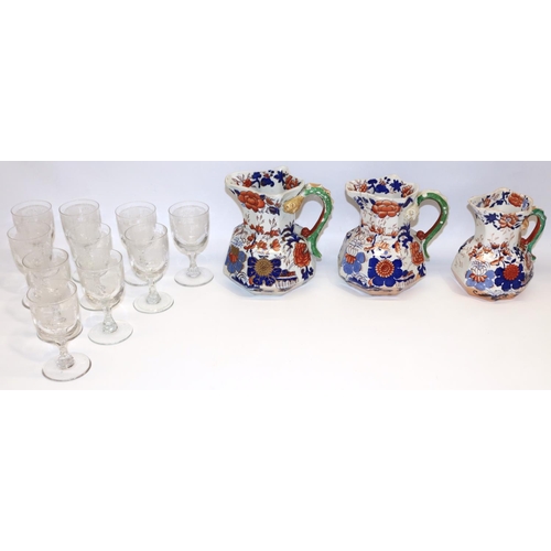 147 - Set of three C19th graduated Masons Ironstone Hydra jugs, each with blue and burnt red Chinoiserie d... 