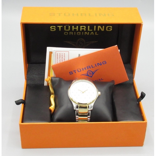 72 - Stuhrling Vogue ladies chrome and gold plated quartz wristwatch on matching bracelet, signed texture... 