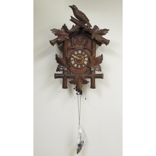 454 - C20th pine and walnut Black Forest cuckoo clock, Roman dial with applied indices, unsigned two train... 