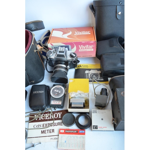 415 - WITHDRAWN - Collection of 35mm film camera equipment and accessories to include an EXA 500 SLR with ... 