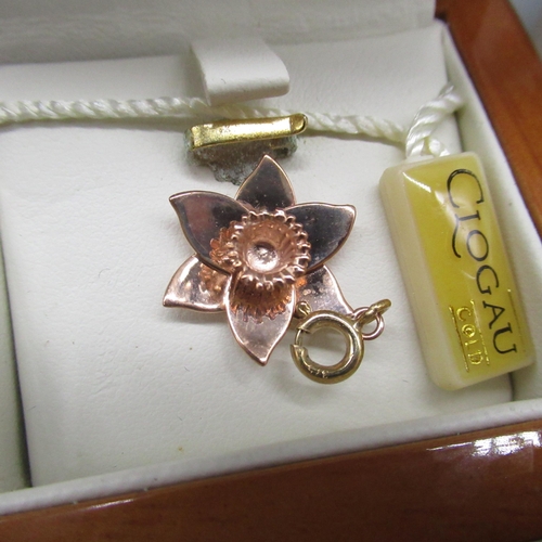 44 - 9ct rose gold Clogau daffodil charm, a pair of 9ct Clogau swallow drop earrings, both stamped 375, a... 