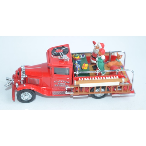 121 - Matchbox Collectibles YSC04-M Santa's 1997 Fire Engine, YSH1 1900 Gypsy Caravan, YSH2 1886 London Om... 