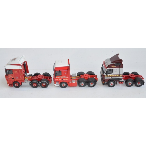 130 - Thirteen unboxed Corgi 1/50 scale diecast truck cab models, all in at least near mint condition exce... 