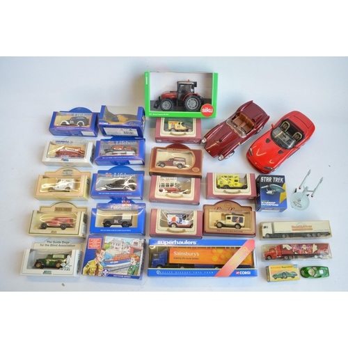 132 - Mixed lot of mostly diecast vehicle models to include Lledo, Corgi, Siku and Burago. Also included a... 