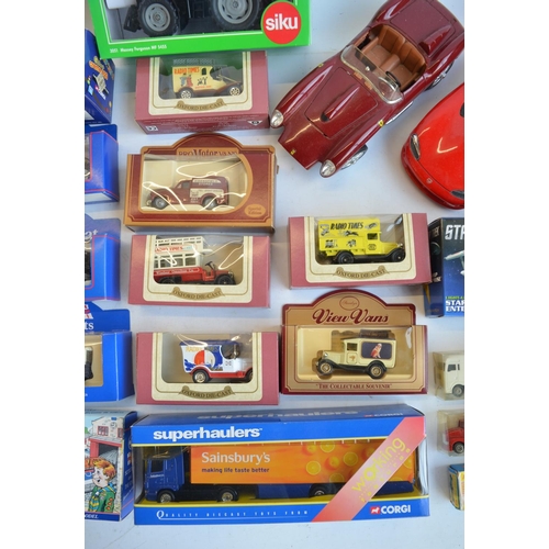 132 - Mixed lot of mostly diecast vehicle models to include Lledo, Corgi, Siku and Burago. Also included a... 