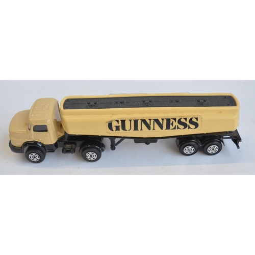 134 - Collection of diecast Corgi Guinness themed model vehicles and vehicle sets to include 2 vehicle lim... 