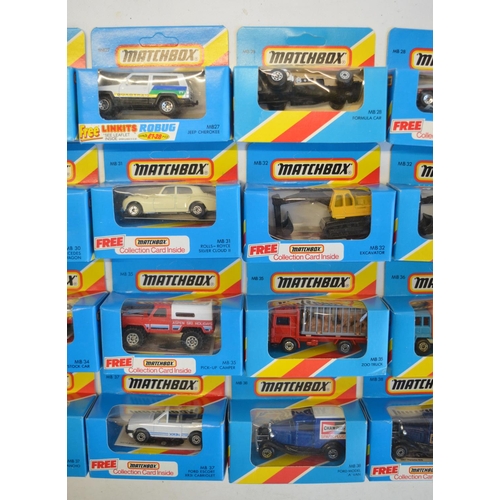 139 - Twenty five boxed early 1980s Matchbox diecast models in the MB26 to MB38 ranges, striped and plain ... 