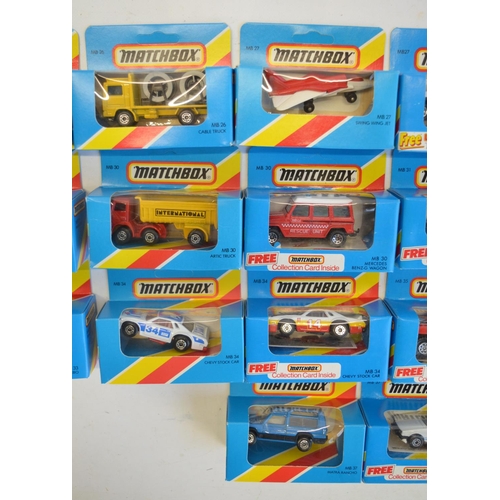 139 - Twenty five boxed early 1980s Matchbox diecast models in the MB26 to MB38 ranges, striped and plain ... 