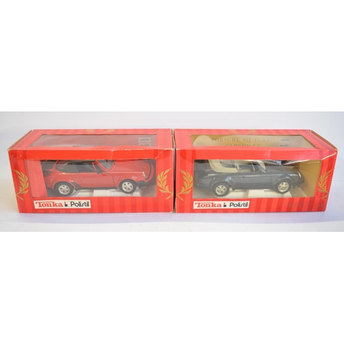 145 - Extensive collection of mostly Porsche related diecast model vehicles, various scales and manufactur... 