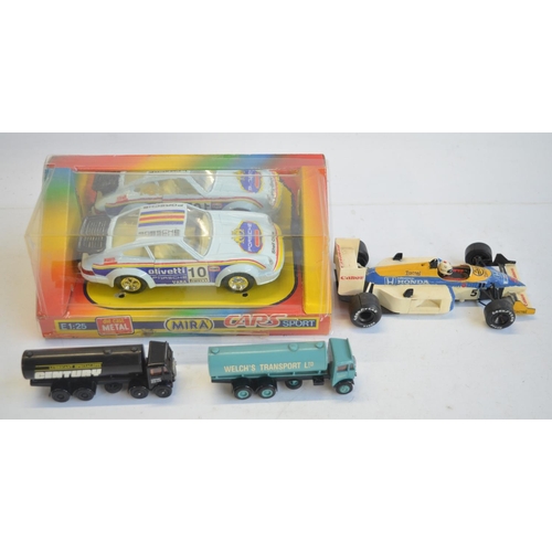 145 - Extensive collection of mostly Porsche related diecast model vehicles, various scales and manufactur... 