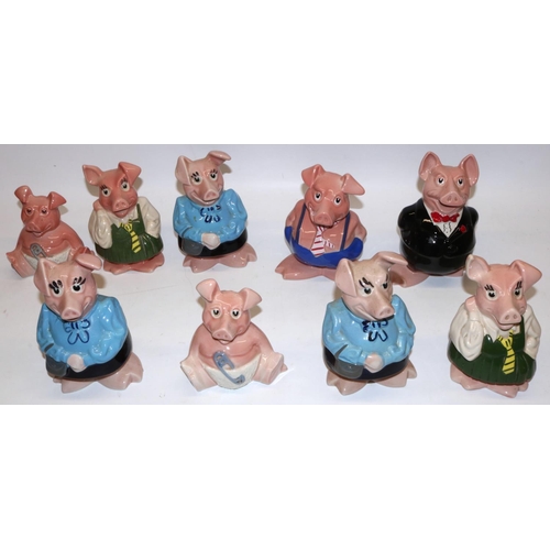 344 - Set of five Wade Natwest piggy banks and four others, some lacking stopper (9)