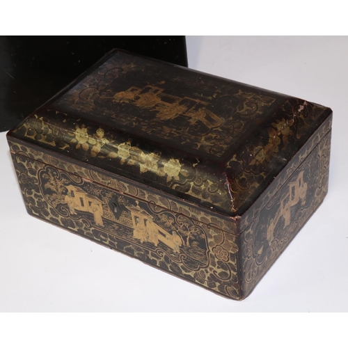 312 - Two C19th black lacquered Chinese boxes, one gilt decorated with figures in a courtyard, L33cm and L... 