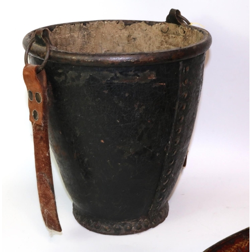 243 - C19th oval toleware tray, L60cm; and a C19th studded leather fire bucket, H28cm (2)