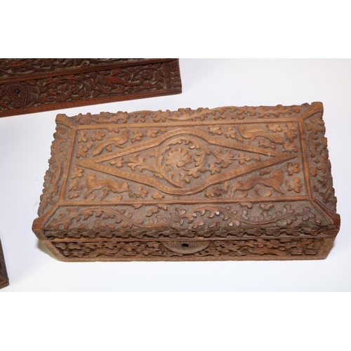 246 - Three Indian carved wood boxes, max. L29cm (3)