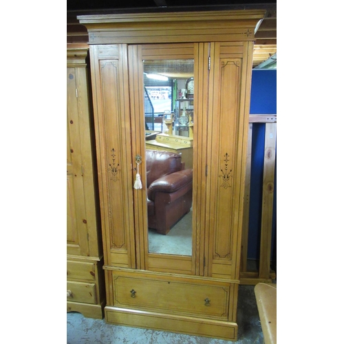 648 - Arts and Crafts ash wardrobe, with black painted detail, moulded cornice and mirror door above a dra... 