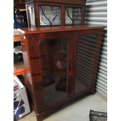 720 - Victorian mahogany bookcase, with two glazed doors and three adjustable shelves on bracket feet, W12... 