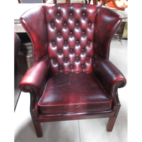 659 - Mill Brook Furnishings Geo. 111 style red leather upholstered wing back arm chair, deep buttoned bac... 