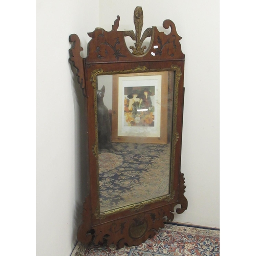 690 - Large Chippendale style wall mirror, parcel gilt mahogany frame with fleur-de-lys cresting and shell... 