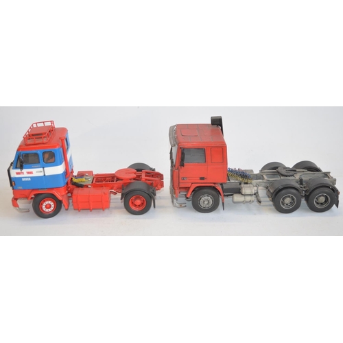 163 - Two well built and detailed sympathetically weathered 1/24 scale Volvo scale plastic truck model kit... 