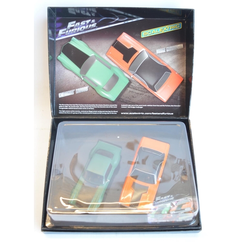 168 - Scalextric C3373A limited edition Fast And Furious 2 car racing set, 1440/3000. Box and contents min... 