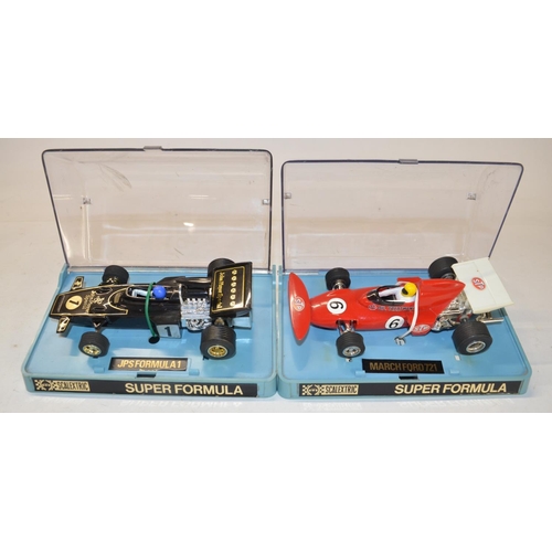 174 - Modern Scalextric C3544A Legends limited edition Team Lotus Type 49 vs McLaren M7c 2 car racing set,... 