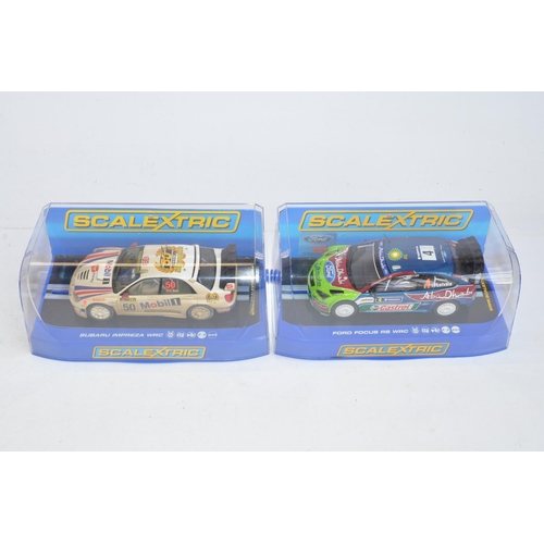 182 - Six as new Scalextric WRC and WTCC slot racing car models to include C2962 Ford Focus, C2789 Subaru ... 