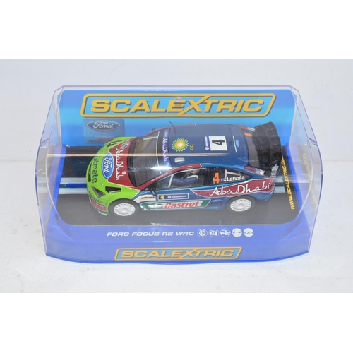 184 - Six Scalextric rally slot racing car models to include limited edition C2487A Skoda Fabia WRC Works ... 