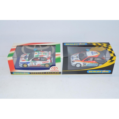 184 - Six Scalextric rally slot racing car models to include limited edition C2487A Skoda Fabia WRC Works ... 