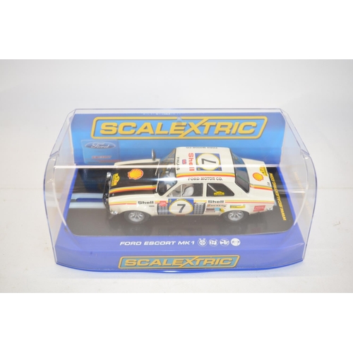 188 - Three as new/never run Scalextric Ford Escort MkI rally cars to include C3029 RS 1600 No13 1973 RAC ... 