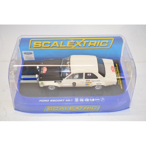 188 - Three as new/never run Scalextric Ford Escort MkI rally cars to include C3029 RS 1600 No13 1973 RAC ... 