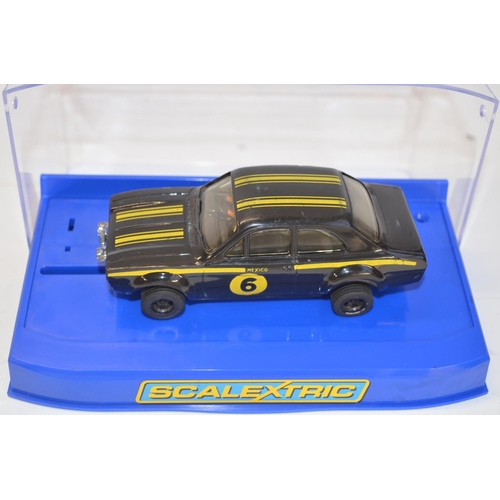 188 - Three as new/never run Scalextric Ford Escort MkI rally cars to include C3029 RS 1600 No13 1973 RAC ... 