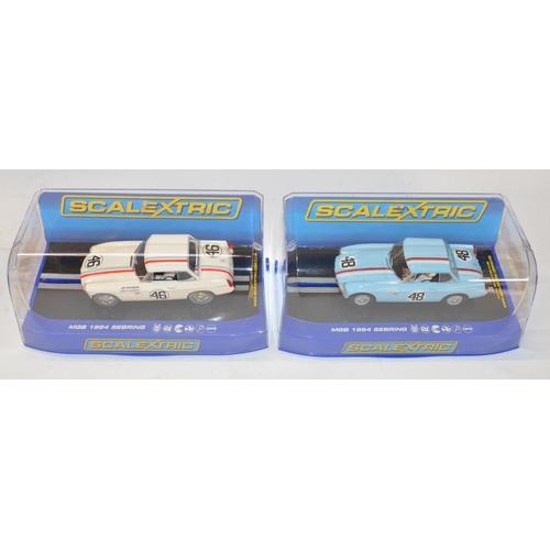 194 - Five as new/never run Scalextric MGB slot car racing models to include C3312 1964 Sebring, C3415 No4... 