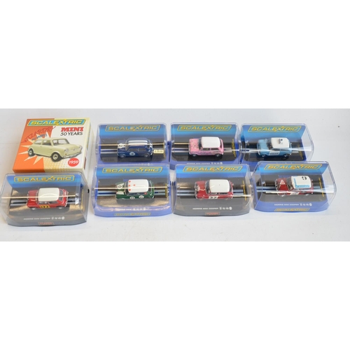 196 - Eight boxed Scalextric 1/32 scale Morris Mini slot car models to include Wizardry On Wheels limited ... 