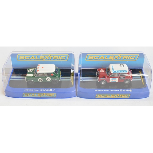 196 - Eight boxed Scalextric 1/32 scale Morris Mini slot car models to include Wizardry On Wheels limited ... 