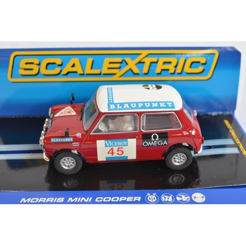 196 - Eight boxed Scalextric 1/32 scale Morris Mini slot car models to include Wizardry On Wheels limited ... 